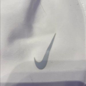 White Nike shorts